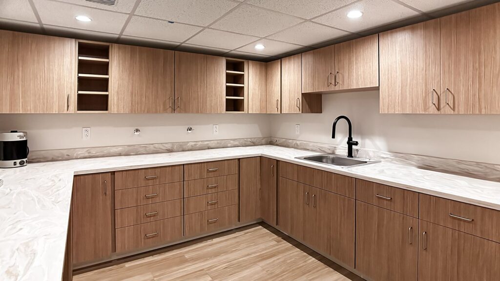 Sterilization area featuring built-in cabinetry and durable surface materials.