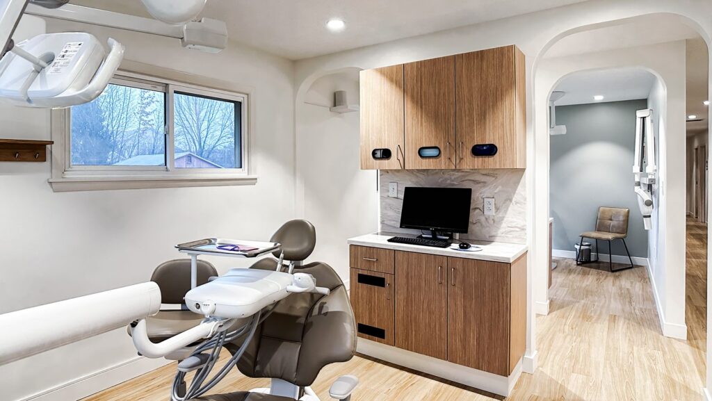 Panoramic imaging area with dental X-ray equipment and minimalist interior design.