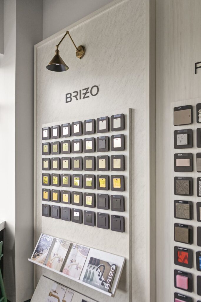 Brizo and Delta display walls featuring finish options and interactive designer tools.