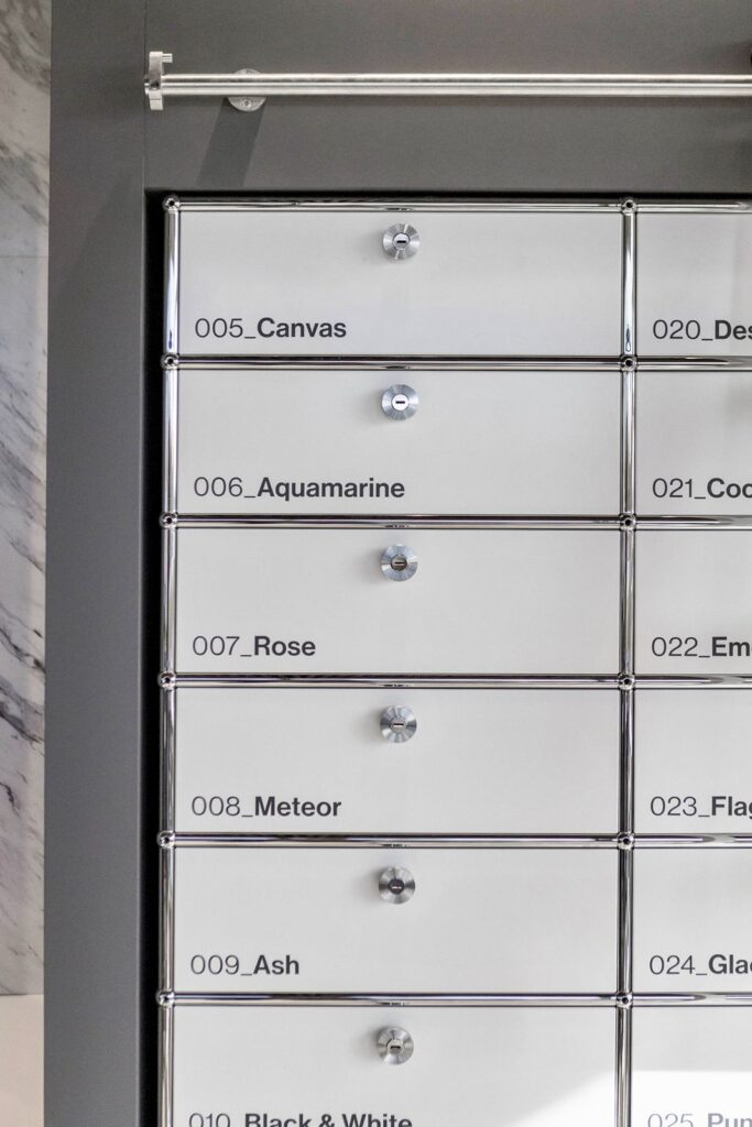 Drawer system labeled with finish names for designer use in Indianapolis showroom.