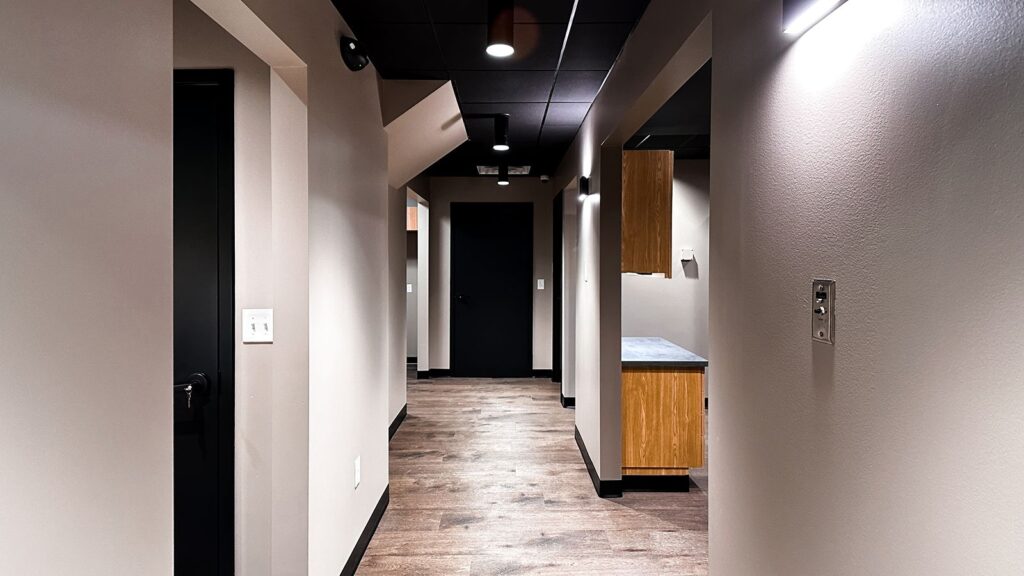 Clinic corridor with sleek finishes and healthcare architecture firm craftsmanship.