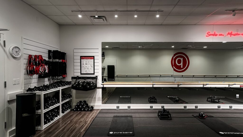 Pure Barre Keystone fitness studio with exercise mats and ballet bar layout.