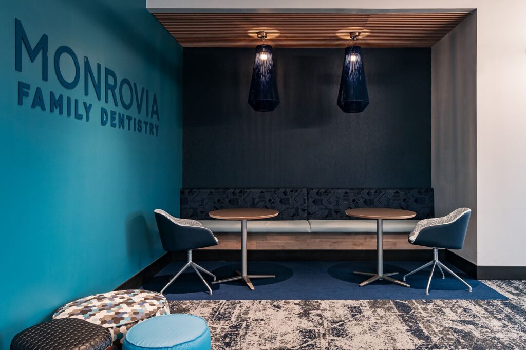 Dental studio design with modern reception desk, healthcare interior design Indianapolis.