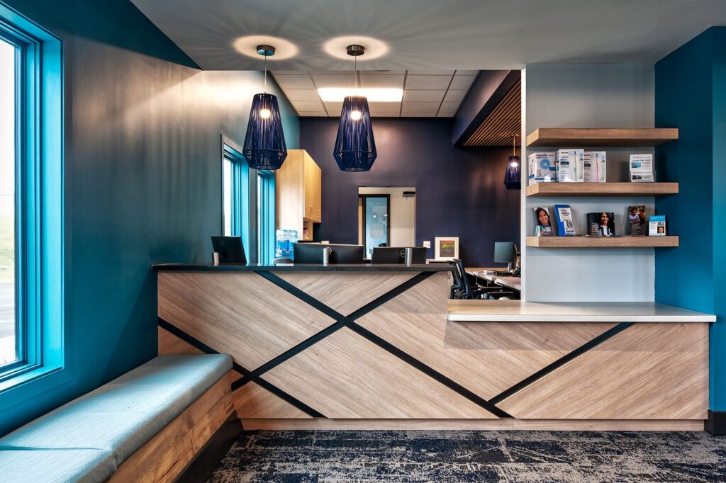 Corporate interior design and healthcare architecture firm detailing a warm, welcoming dental lobby.
