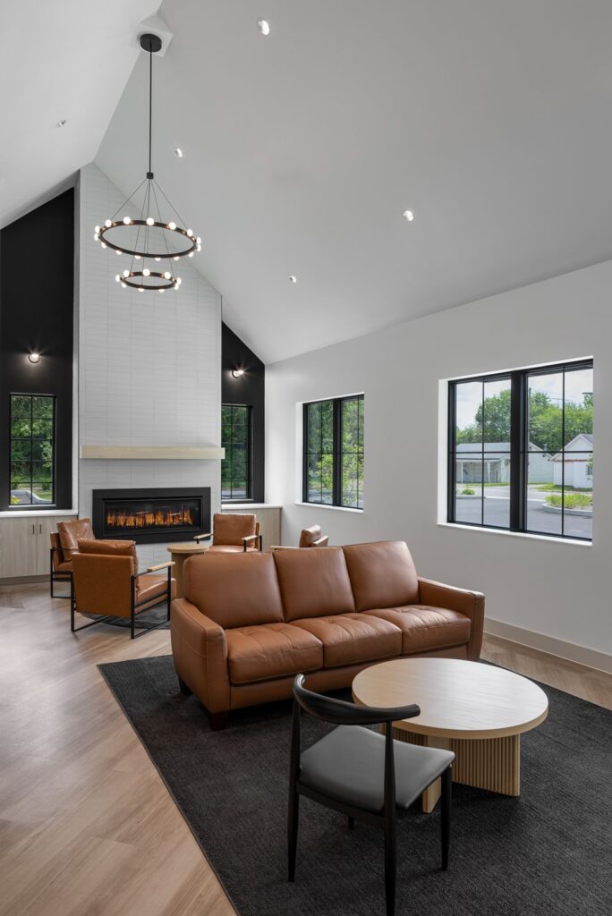 Open waiting lounge designed by dental architects combining natural textures and contemporary furniture.