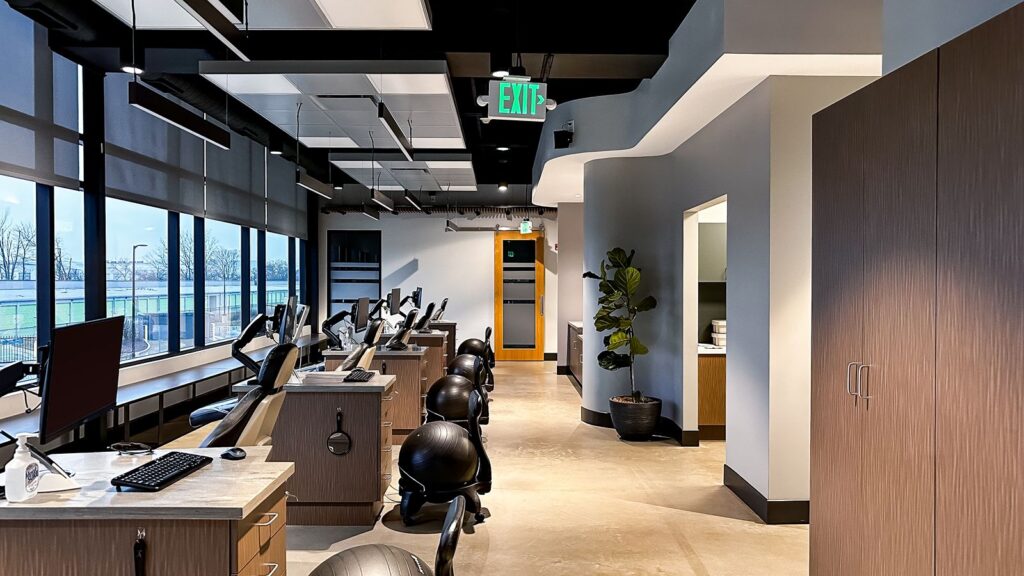 Operatory space designed with wood finishes and dental architecture expertise.