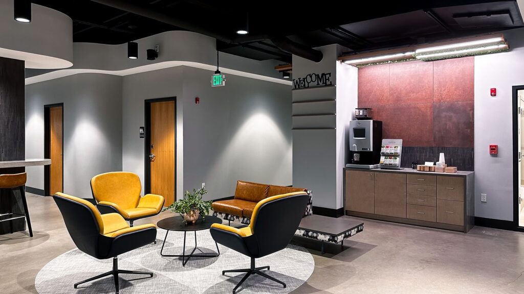 Front desk and waiting area showcasing contemporary dental office interior design.