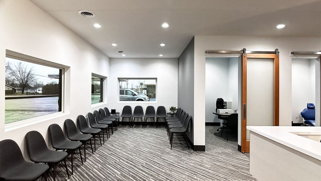 Lobby featuring hexagon tile wall design and clean modern finishes.