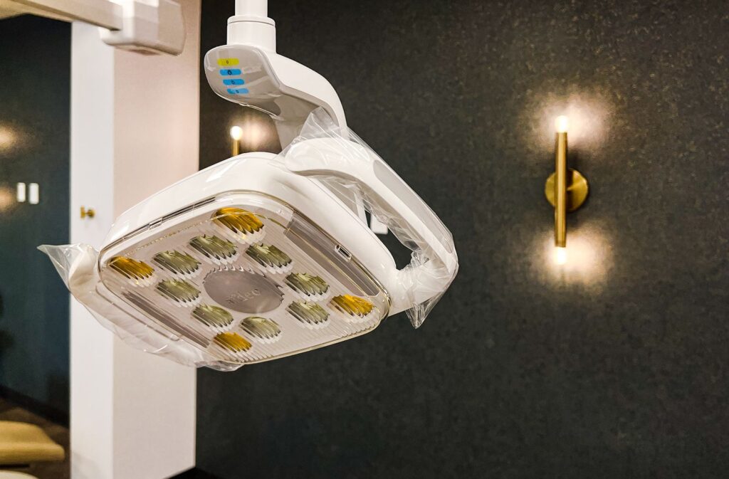 Overhead dental lighting fixture with modern design elements used in orthodontic office architecture.