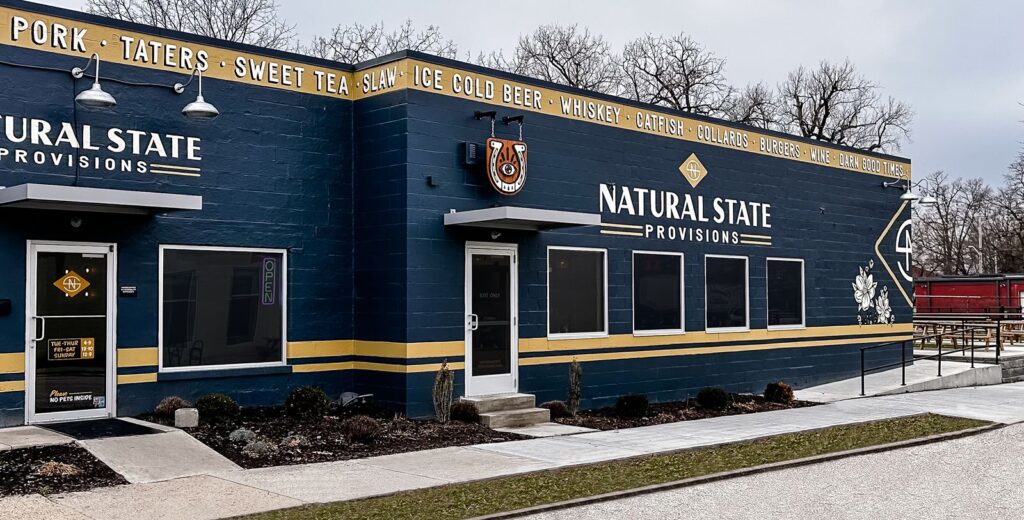 Commercial architecture renovation for restaurant exterior design and brand integration.