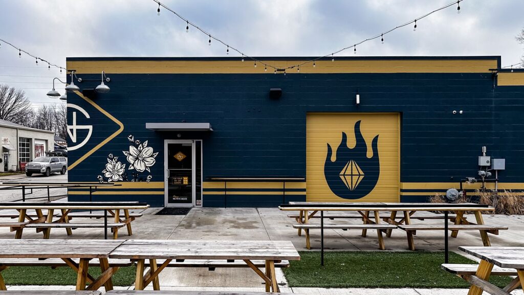 Restaurant exterior design and architectural lighting by hospitality architecture firm.