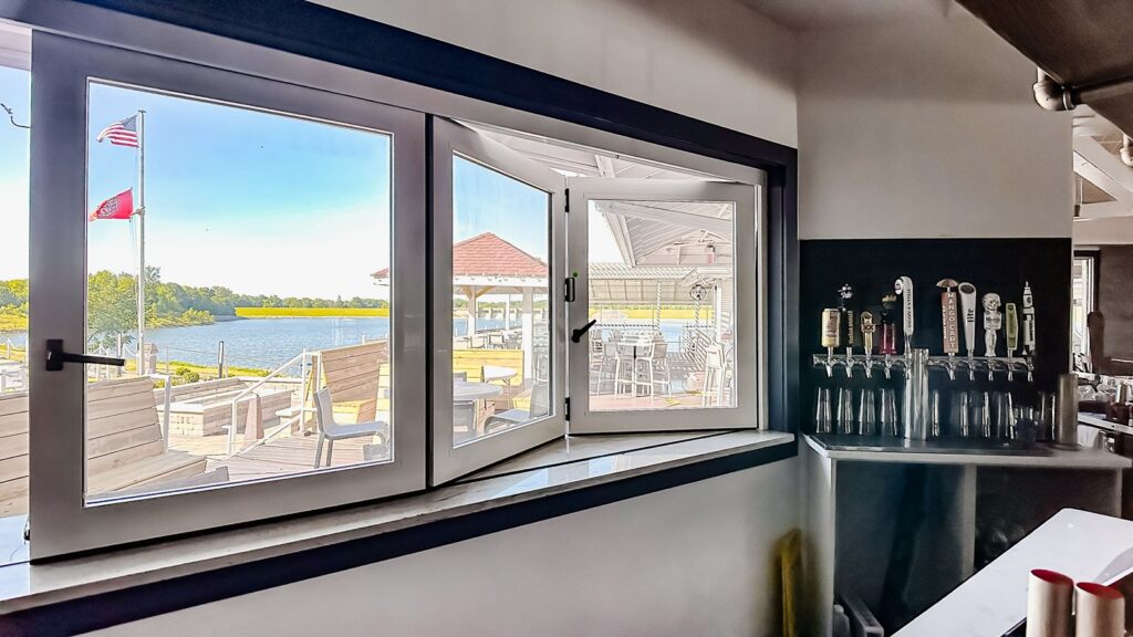 Front entrance area with natural light and modern flooring.