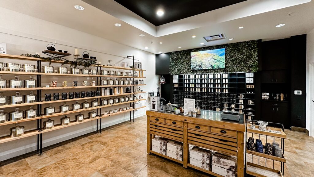 Tea boutique interior with modern lighting and open layout.